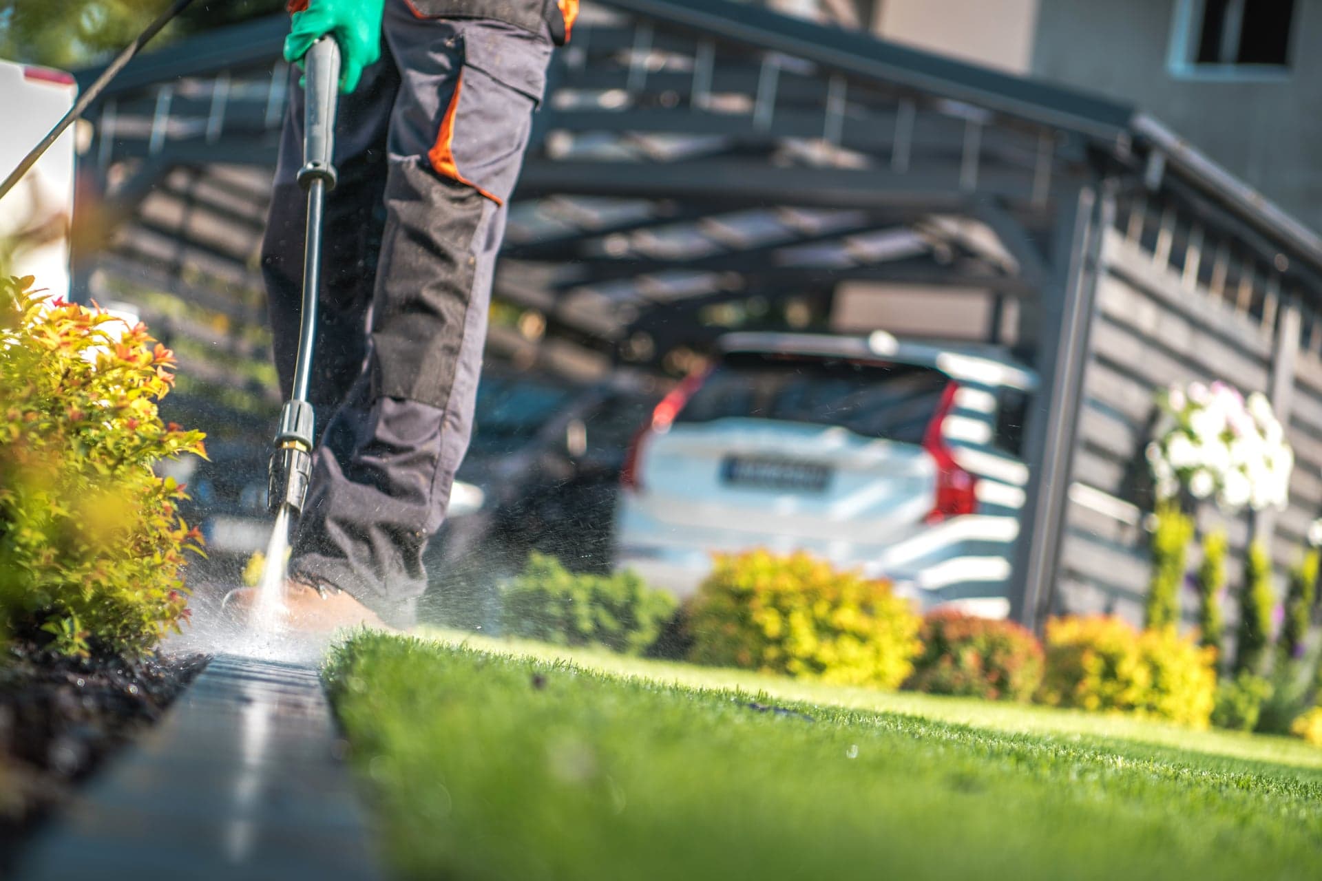 Professional power washing a residential home exterior in Cincinnati